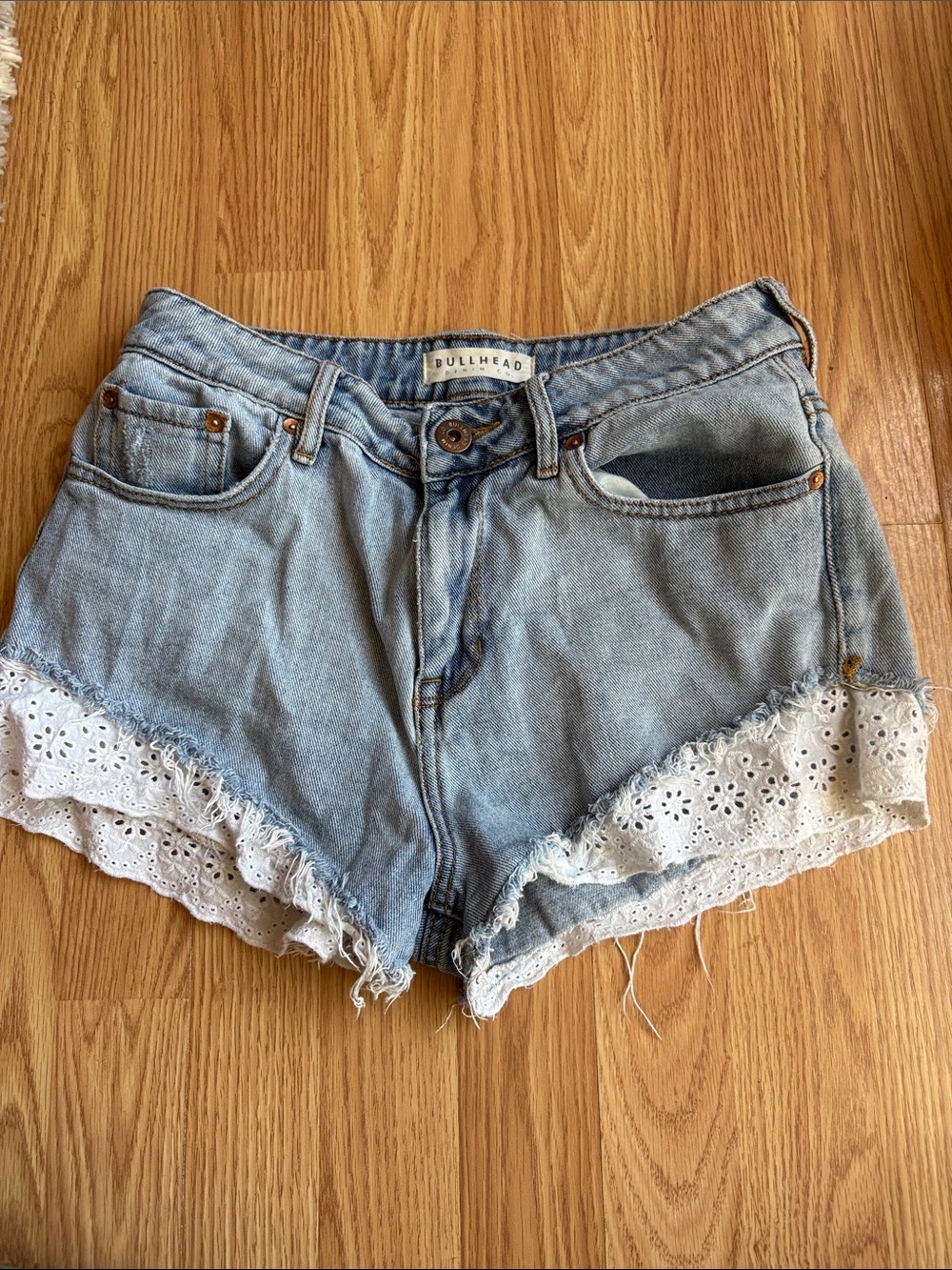 Bullhead Light Blue Denim Shorts with White Eyelet Lace